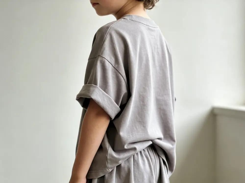 Trendy oversized fit t-shirt for kids with drop shoulder design.