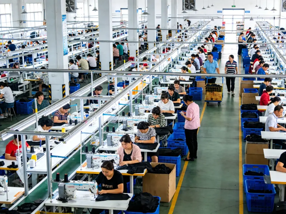 HAPA's modern sewing workshop has multiple production lines, supporting large-scale T-shirt production.