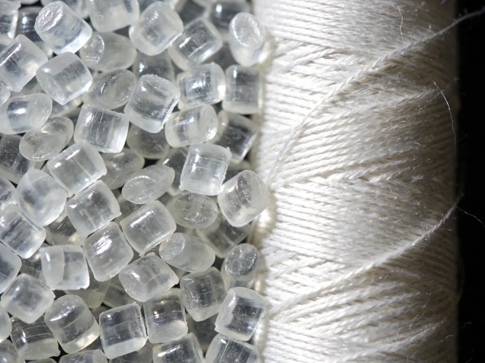 Raw PET plastic chips vs spun polyester filament yarn.