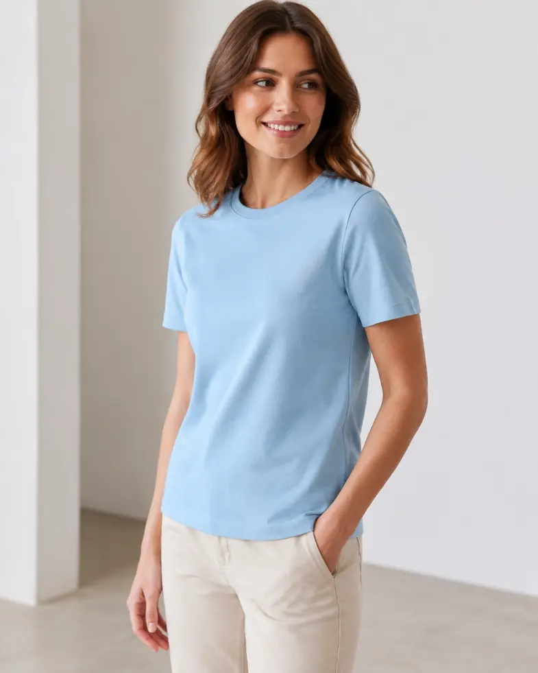 Model wearing a blue short-sleeve T-shirt with standard set-in sleeves