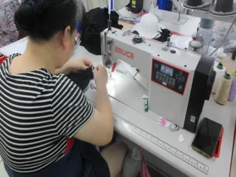 Our experienced seamstress with 15 years of sewing experience is working diligently.